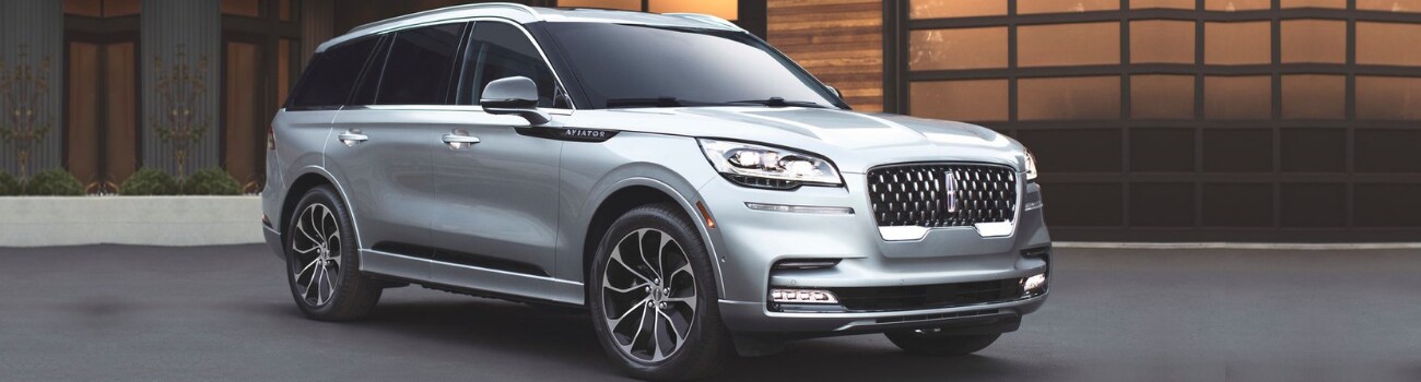2020 Lincoln Aviator in Colorado Springs at Phil Long Lincoln.png Front passenger side view of the 2020 Lincoln Aviator exterior parked outside a home garage