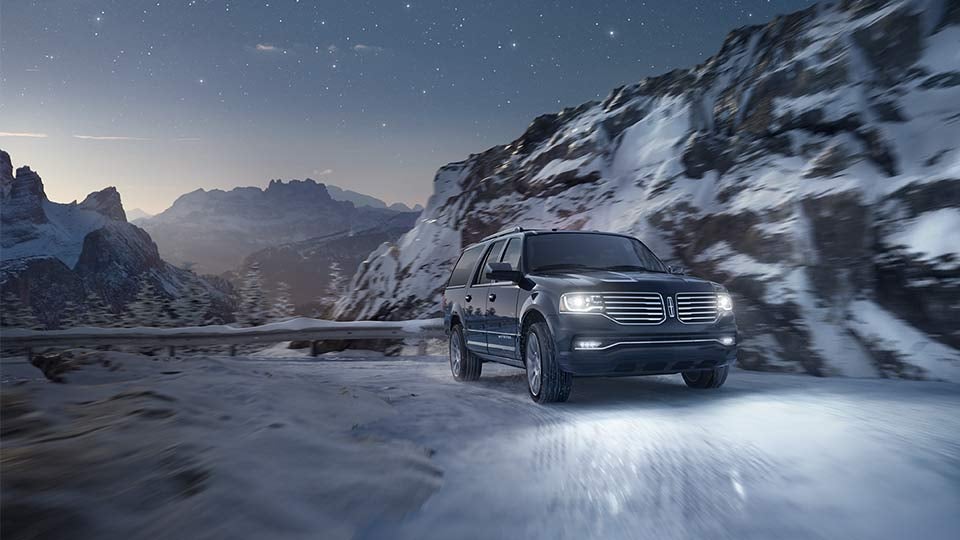A Lincoln driving in Winter