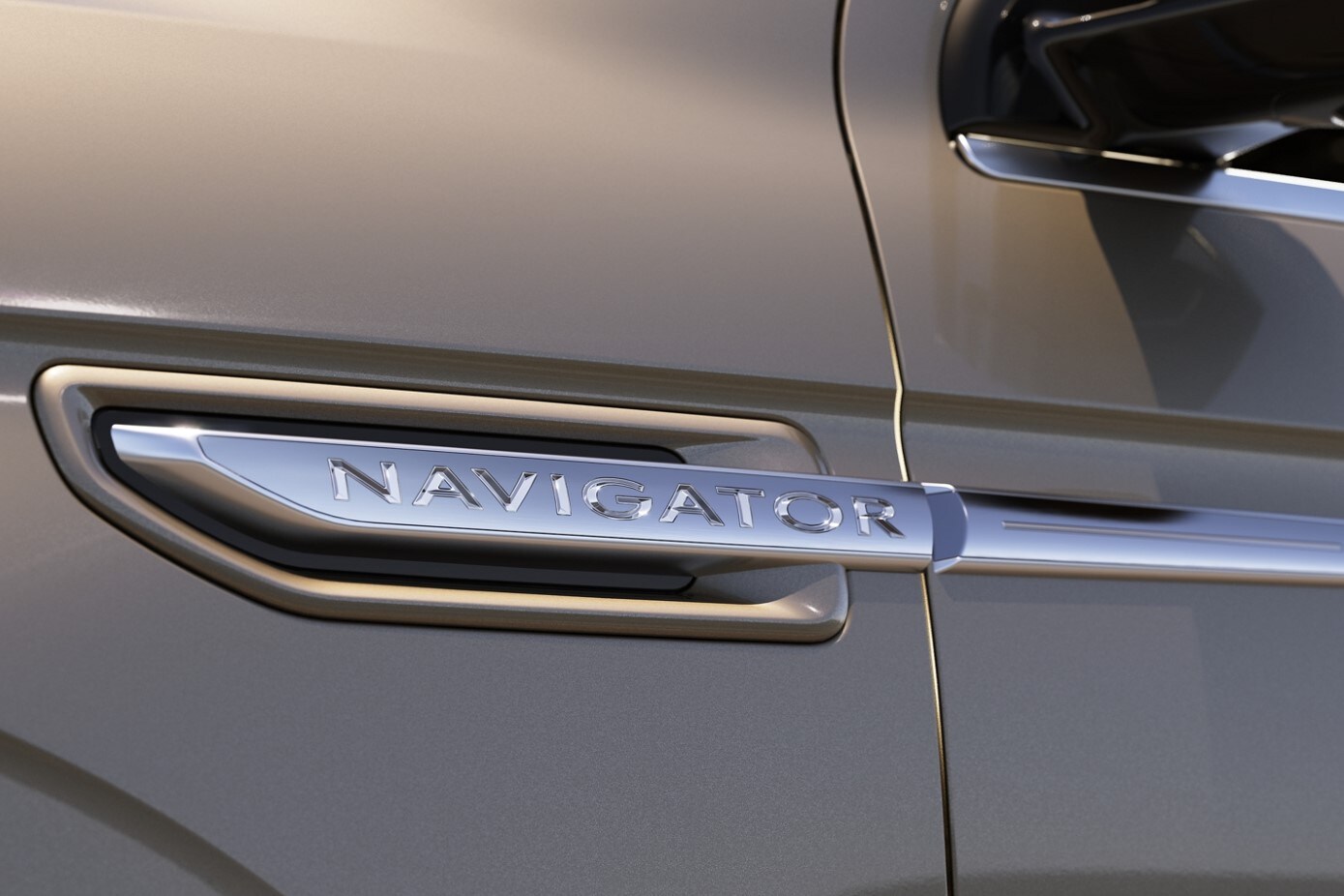2020-lincoln-navigator-12.jpg View of a silver Lincoln Navigator name plate