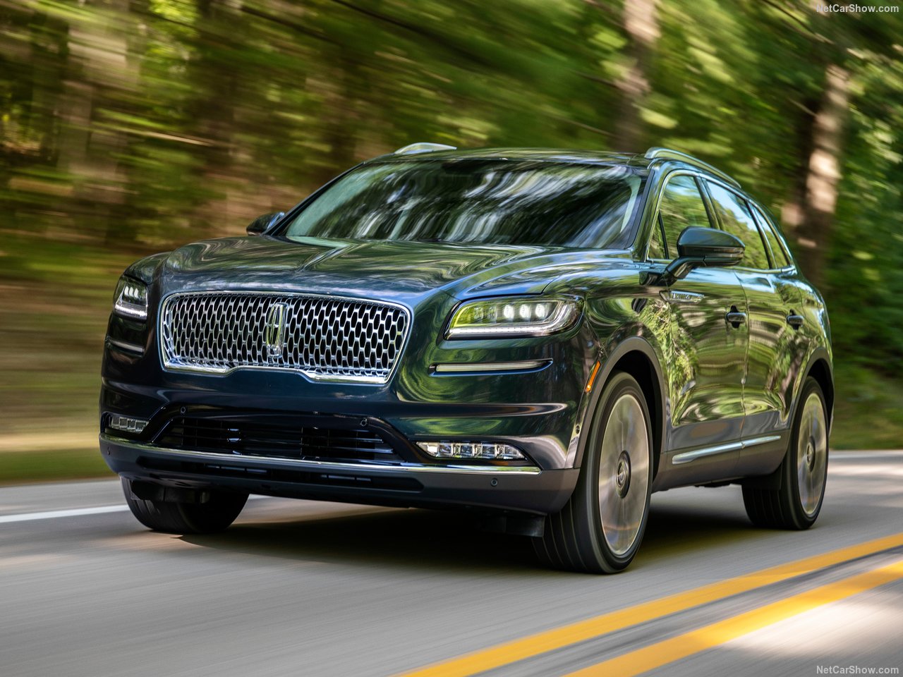 Winter Lincoln 2.jpg A Lincoln Nautilus Driving through a forest.