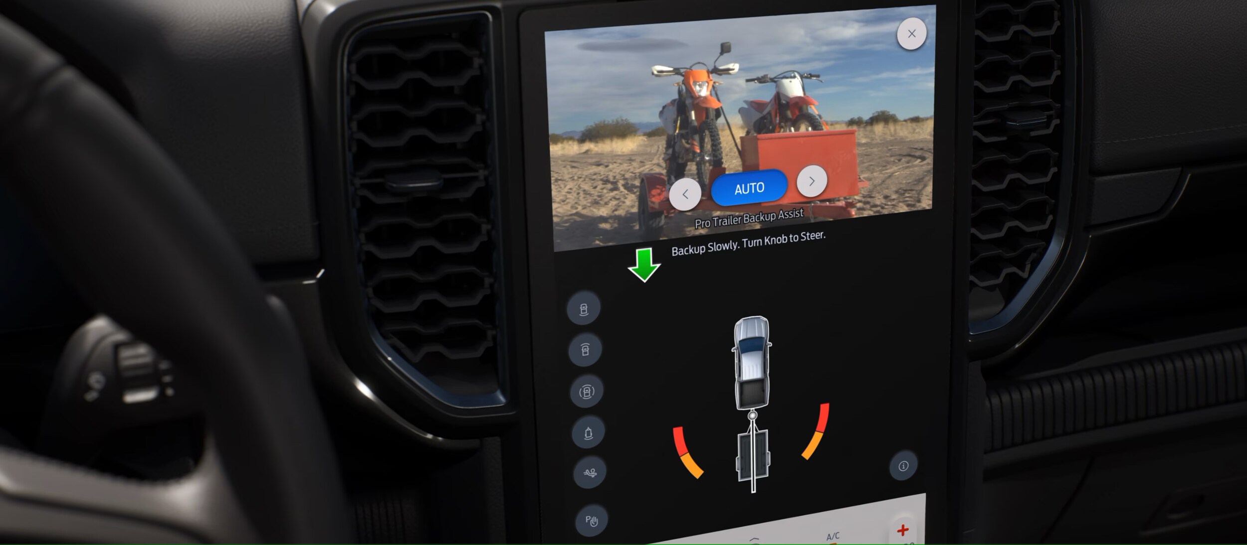 Screenshot%202025-03-18%20203819.png The dashboard screen showing the backup camera and safety features.