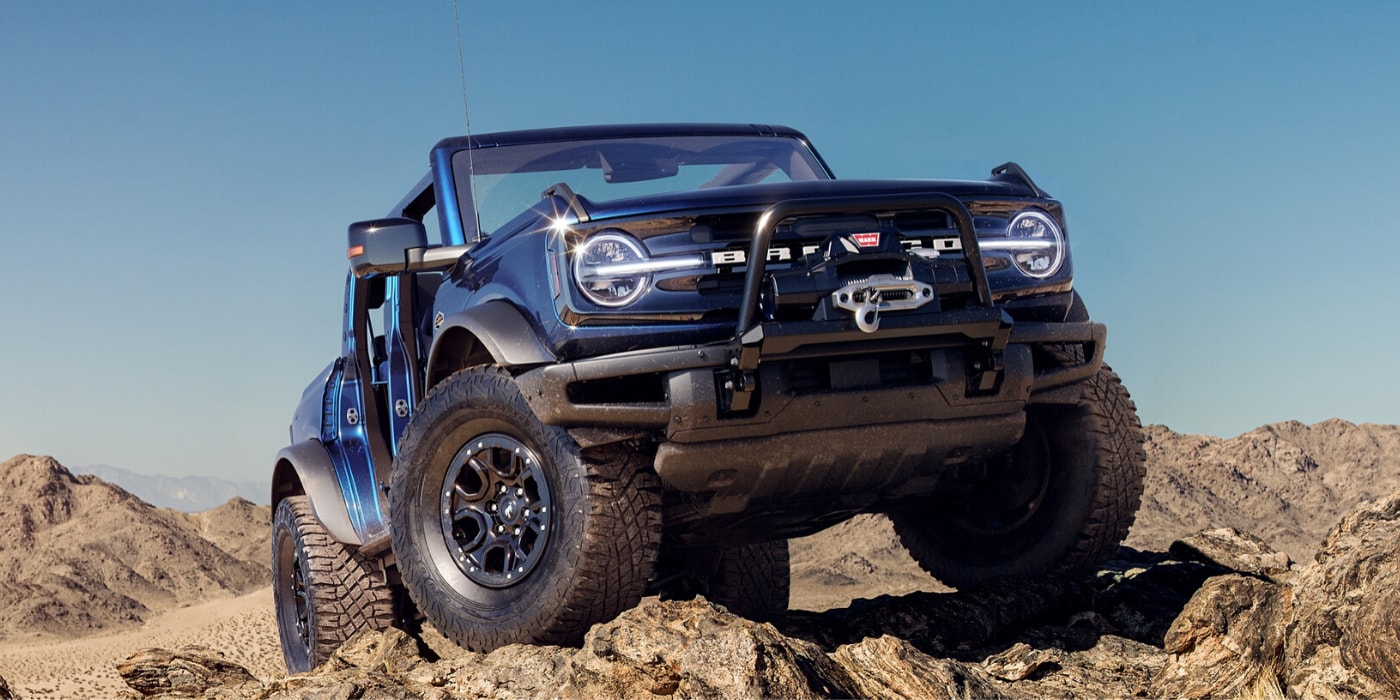 New 2021 Ford Bronco SUV in Raton, NM.png New 2021 Ford Bronco sitting on top of some large rocks
