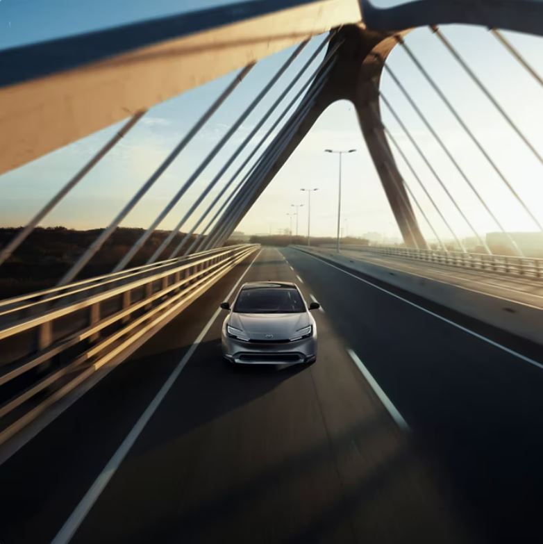 Toyota Technology 5.JPG A Toyota driving across a modern bridge.