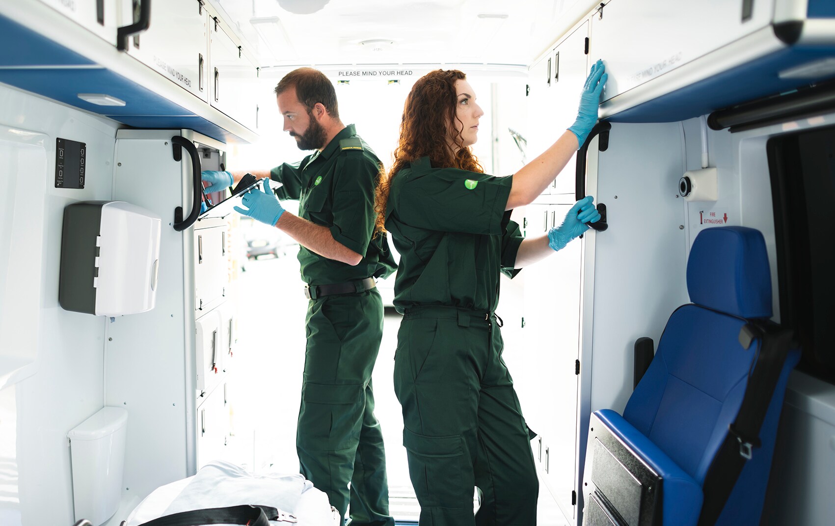 Paramedics working in an ambulance