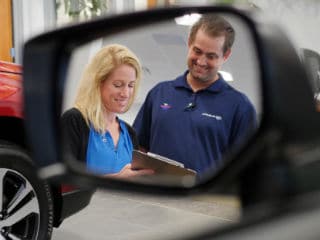 Planet team Dale and Rhonda mirror small.jpg