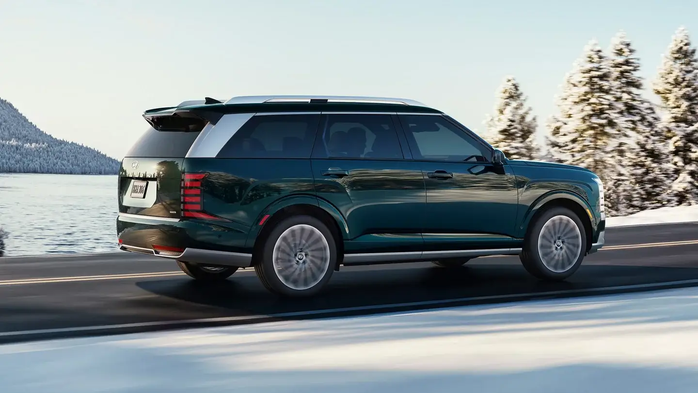 Passenger side profile of a 2027 Hyundai Palisade showing the full body length and upright roofline