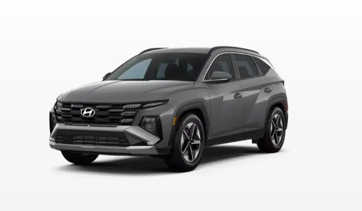 Gray Hyundai Tucson SEL with silver skid plate and 18-inch two-tone alloy wheels, front three-quarter view