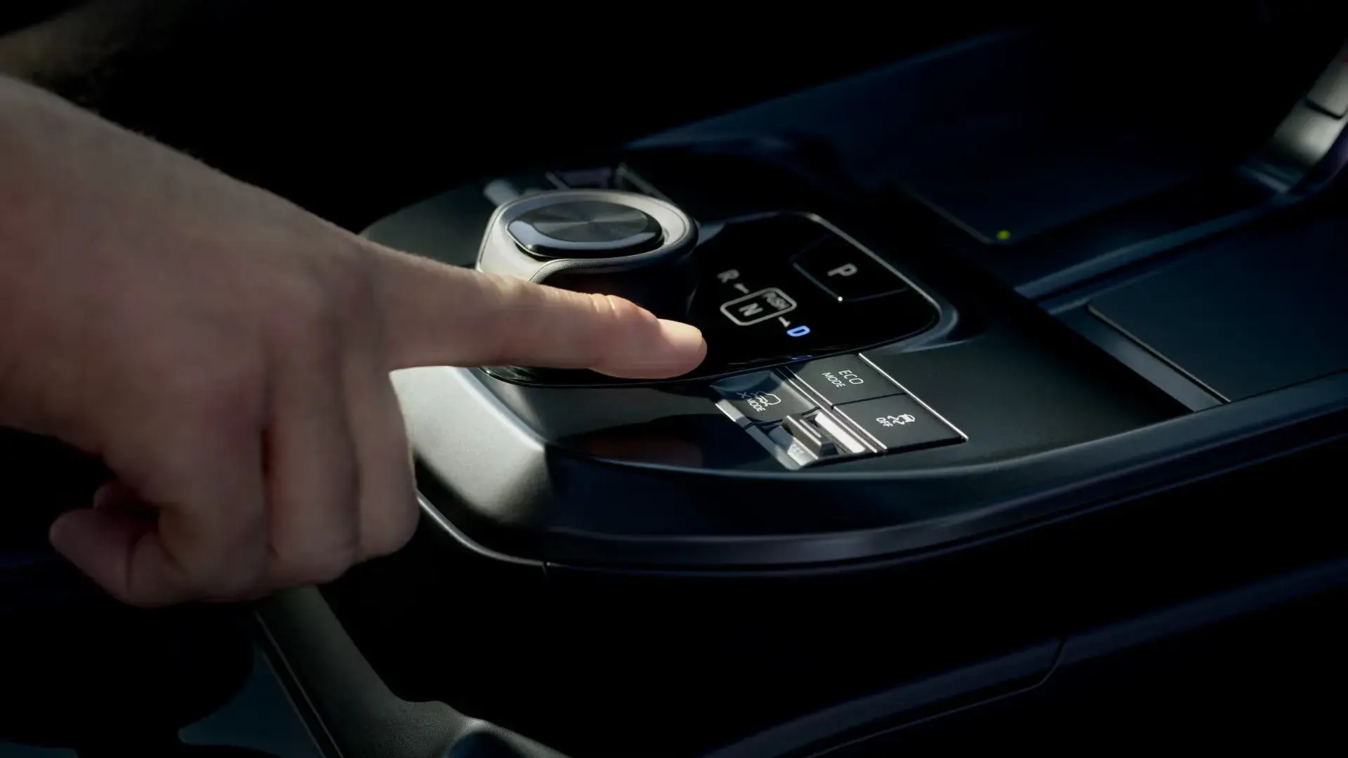 Toyota bZ center console with drive selector, wireless charging pad and storage