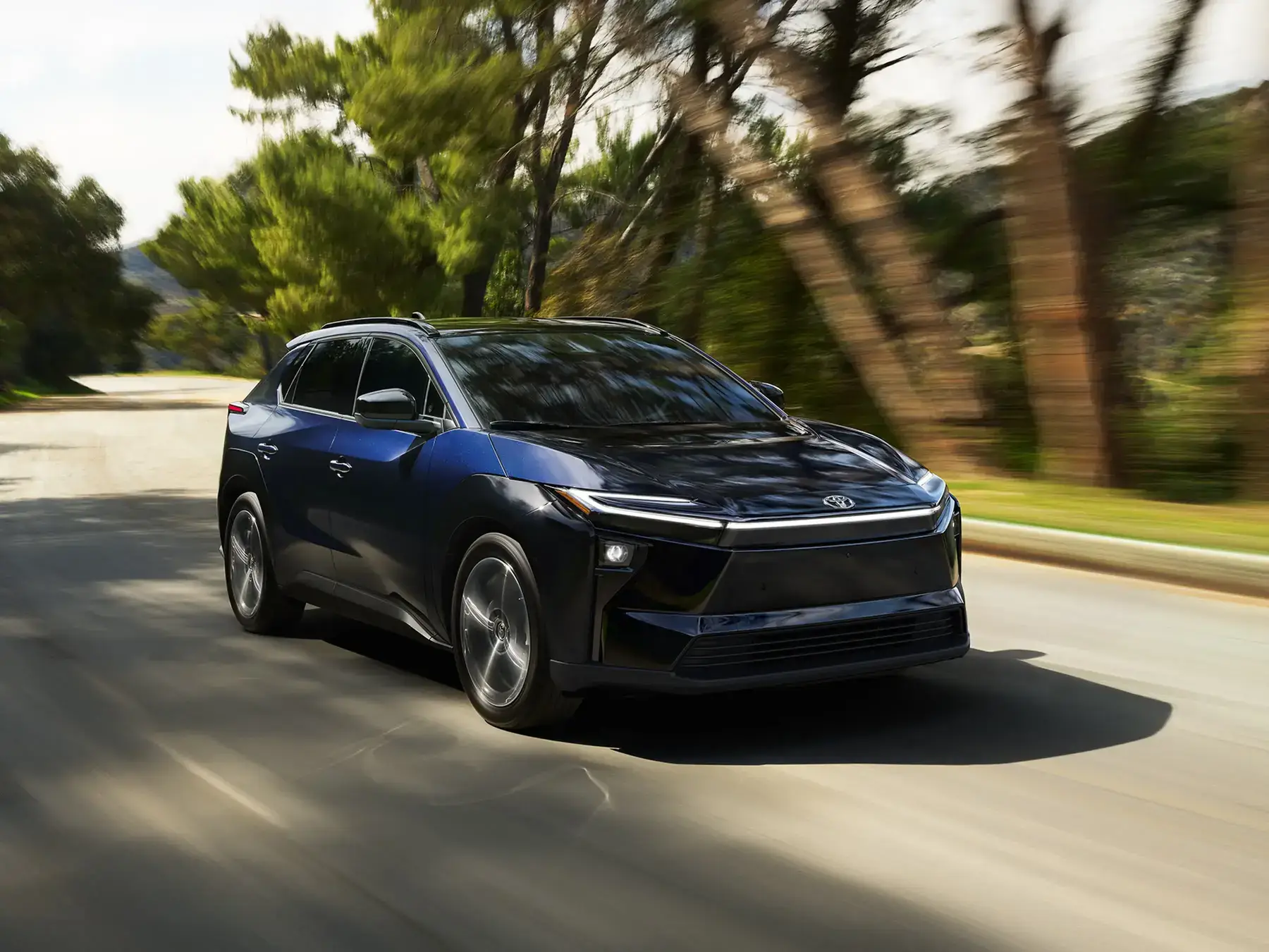Toyota bZ electric SUV exterior styling with black body cladding and geometric wheel arches