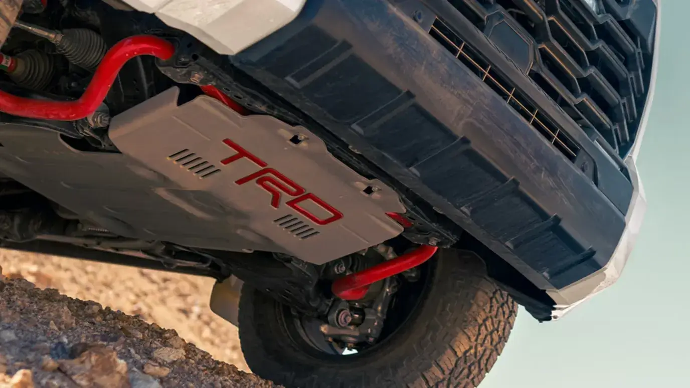 2027 Toyota Tundra TRD Pro suspension with FOX shocks shown on an off-road trail
