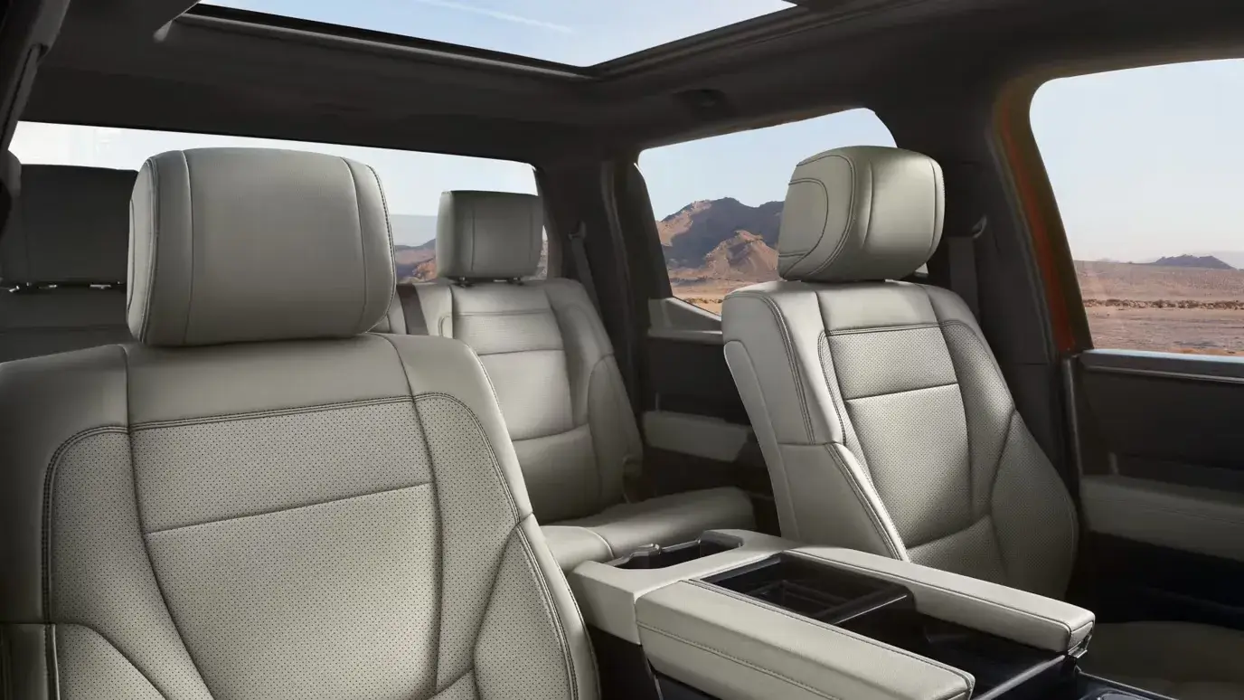 2027 Toyota Tundra interior with beige leather-trimmed seats and panoramic sunroof