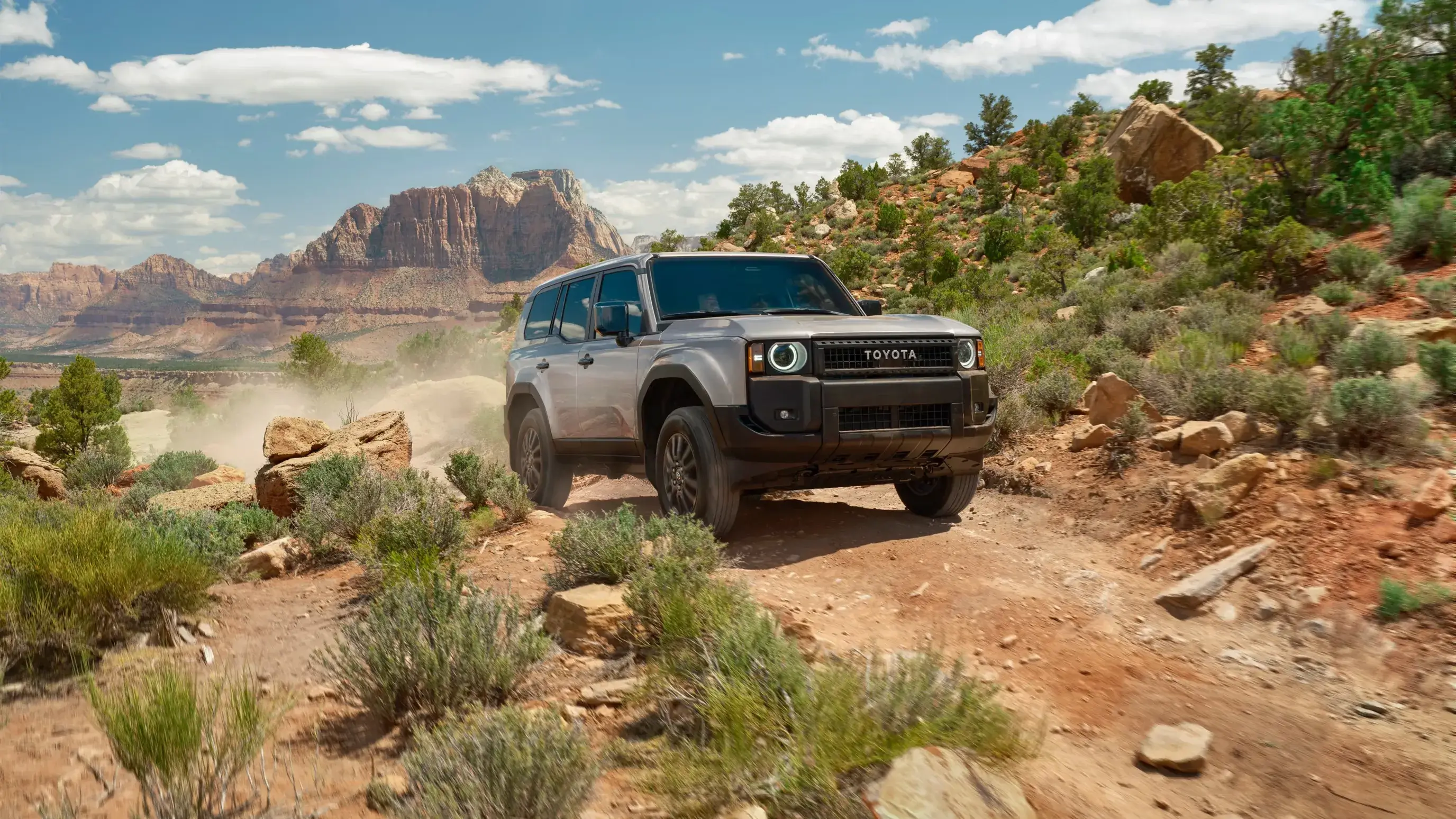 Front three-quarter view of the 2027 Toyota Land Cruiser with rectangular LED headlamps