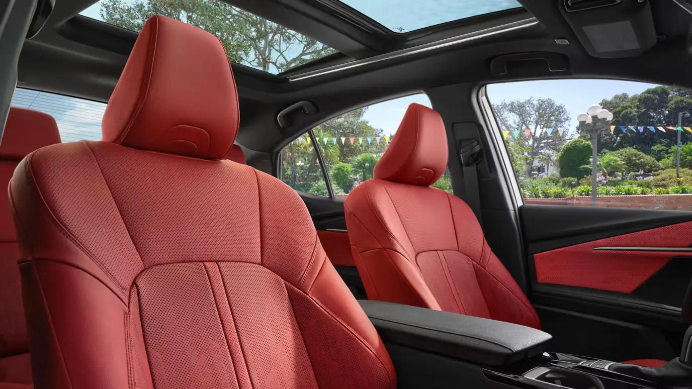 Toyota Camry XSE interior in Cockpit Red leather trim with the sunroof open