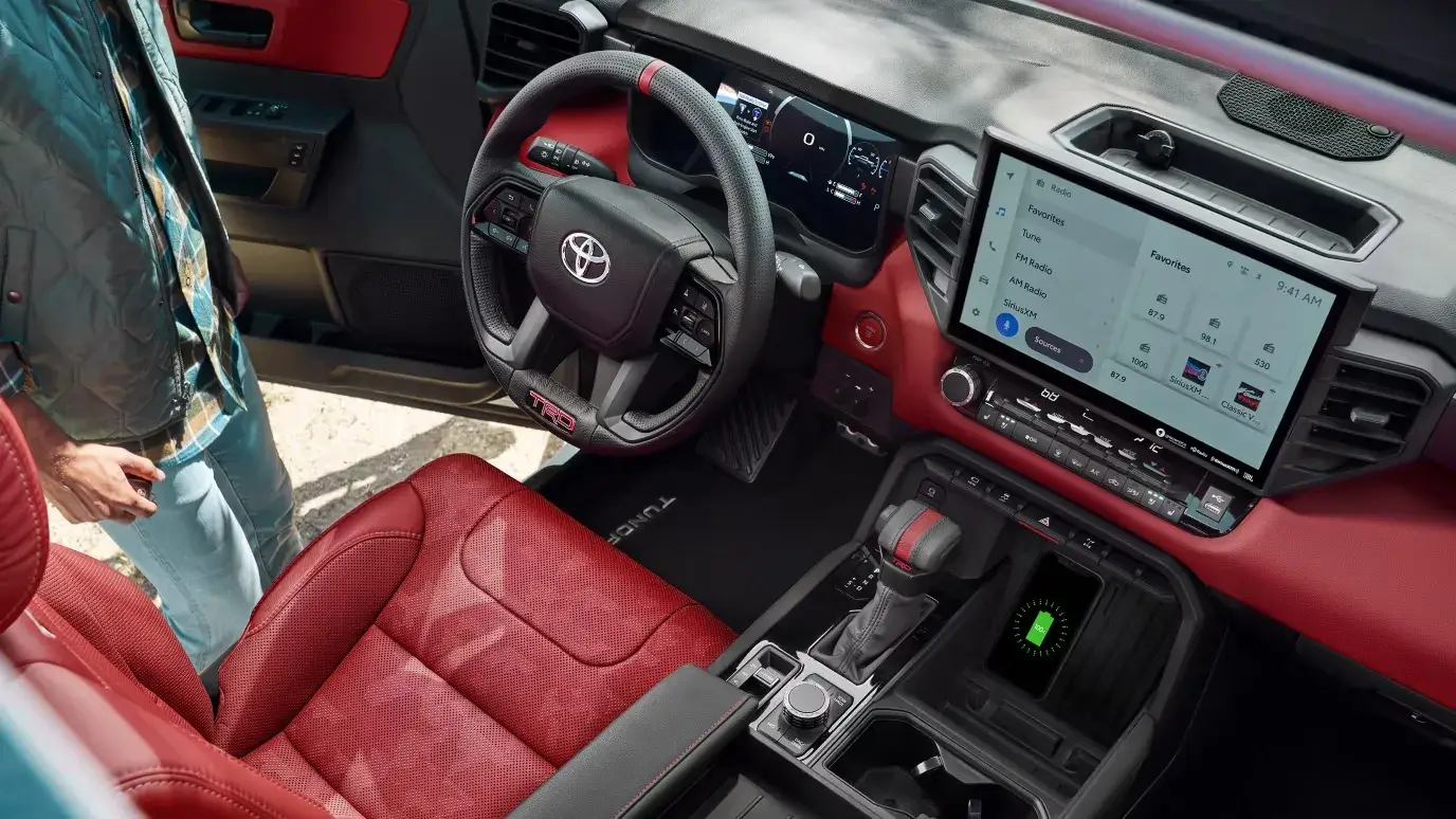 Red leather-trimmed interior of a 2027 Toyota Tundra i-FORCE MAX