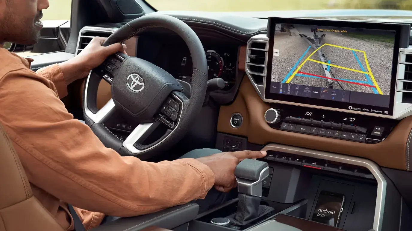 2027 Toyota Tundra i-FORCE MAX steering wheel, shifter and backup camera on the center display