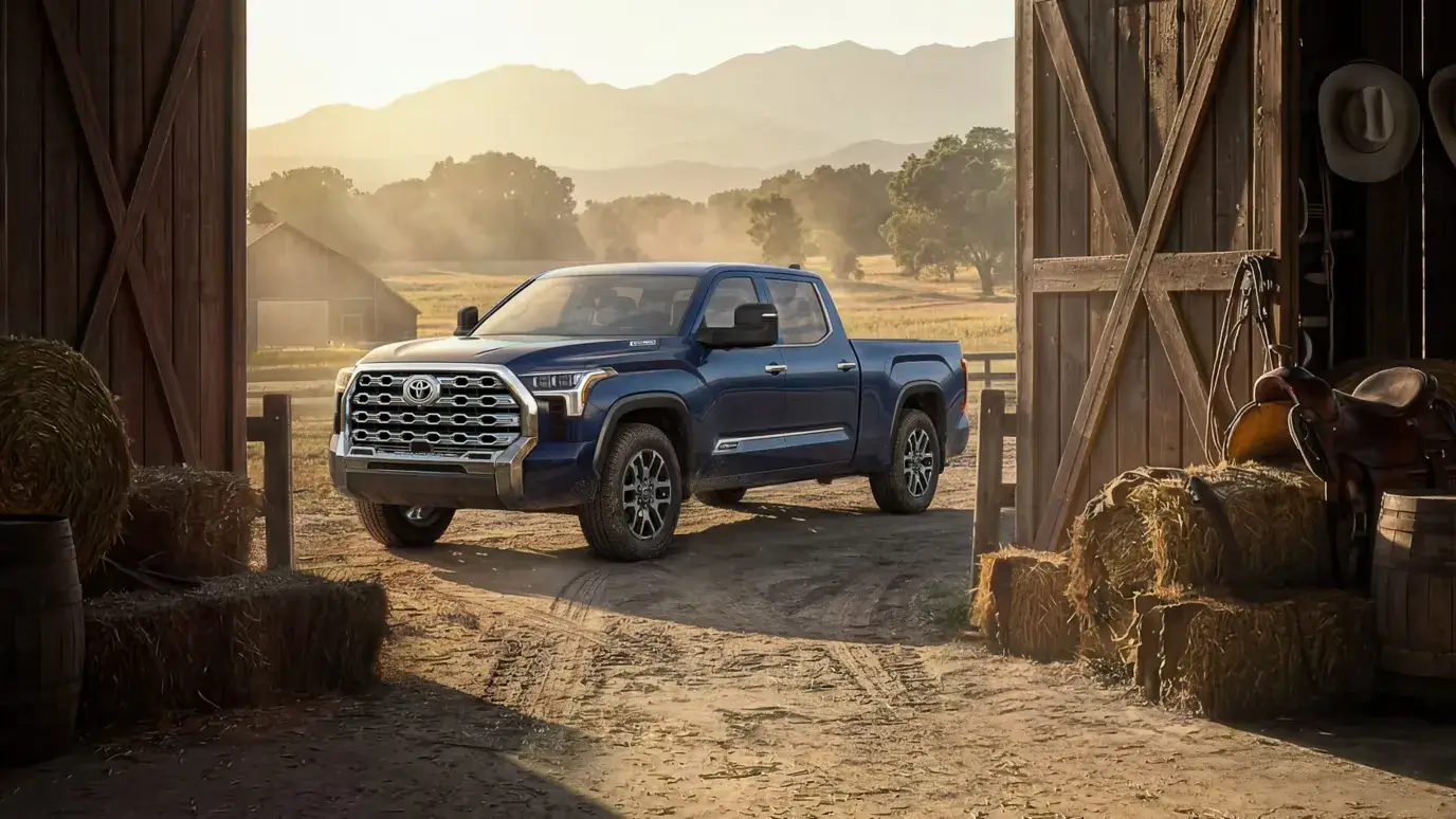 2027 Toyota Tundra i-FORCE MAX front three-quarter view showing the redesigned grille, bumper and lighting