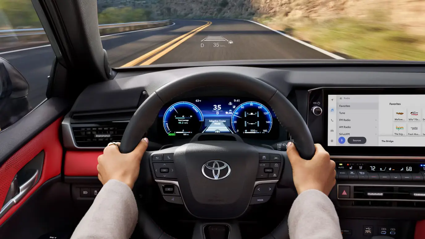 Toyota Camry steering wheel and dashboard with digital gauge cluster
