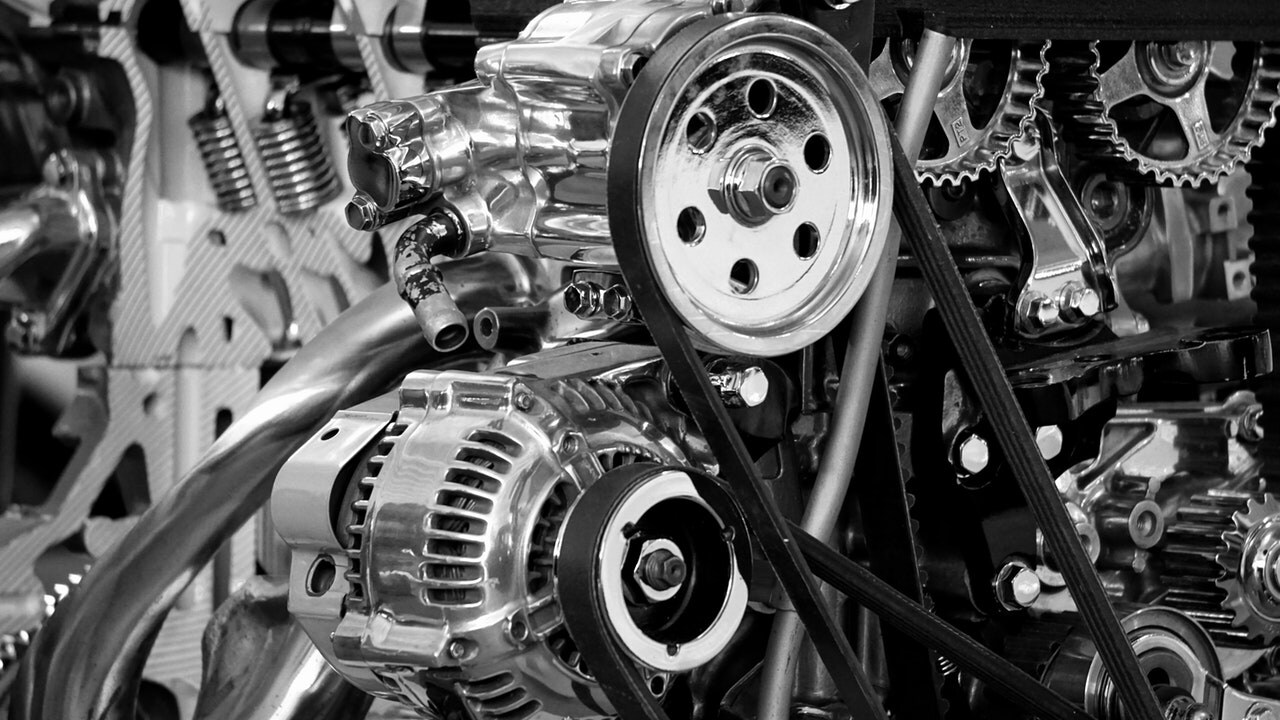 greyscale-photography-of-car-engine-190574.jpg