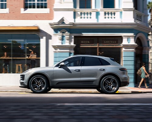 Silver Porsche Macan driving