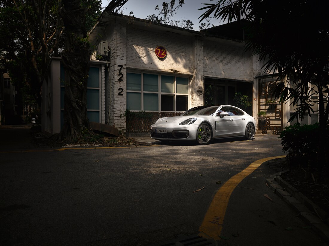 white Porsche Panamera Hybrid hatchback