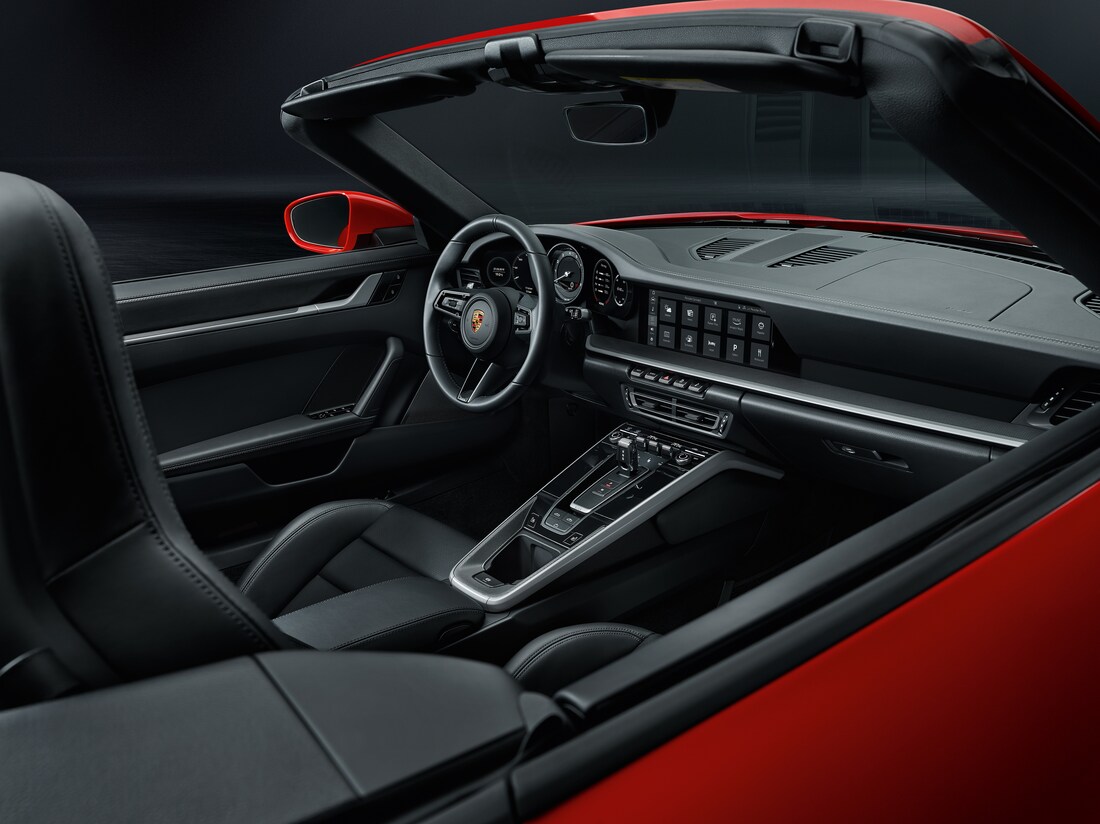 red Porsche 911 Carrera with black interior