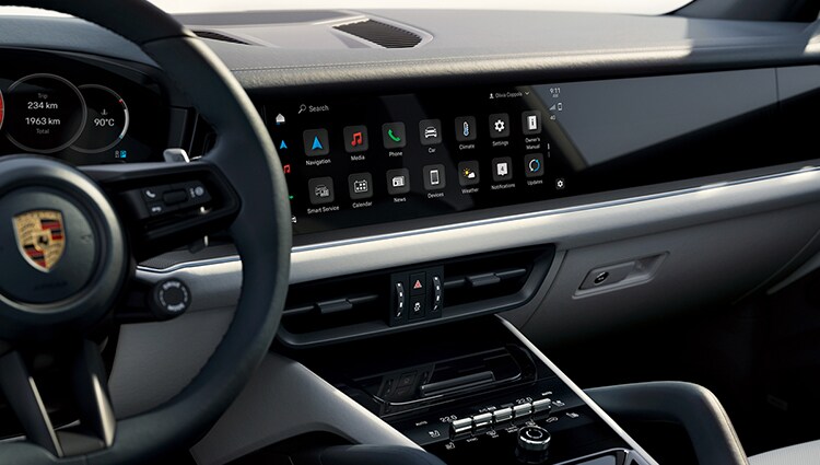 2024 Porsche Cayenne Steering Wheel and Infotainment System.