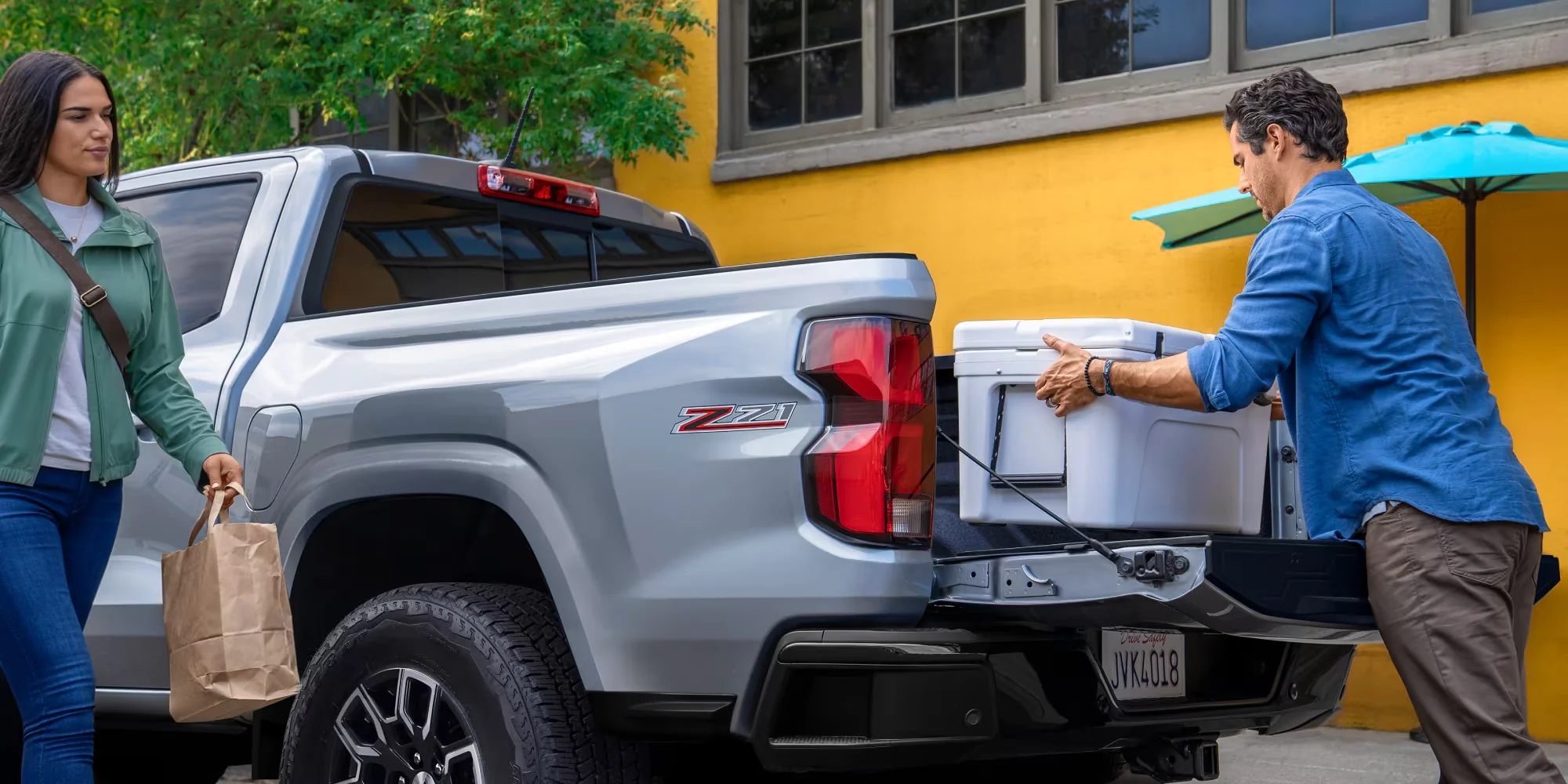 Chevy Colorado crew cab with the tailgate down, everyday hauling use