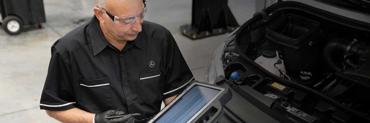 Mercedes-Benz-Sprinter-Van-service.jpg Mechanic repairing a Mercedes-Benz Sprinter Van