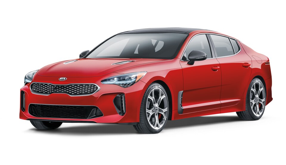 2018 Kia Stinger Base Sedan red angled left white background.jpg