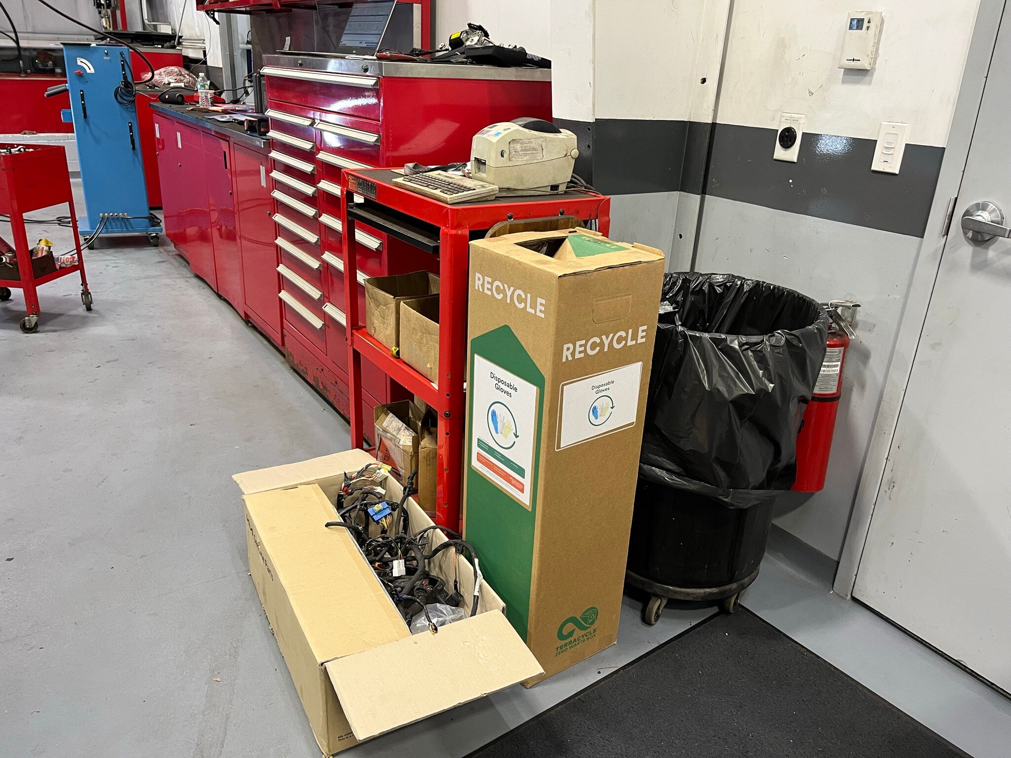 IMG_4755.JPEG Premier Recycles rubber gloves with specially marked recycling boxes in our service department for technicians to dispose of their latex-rubber gloves