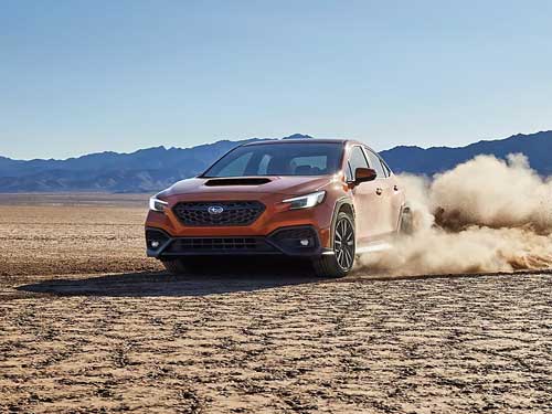 2024 Subaru WRX driving in dirt