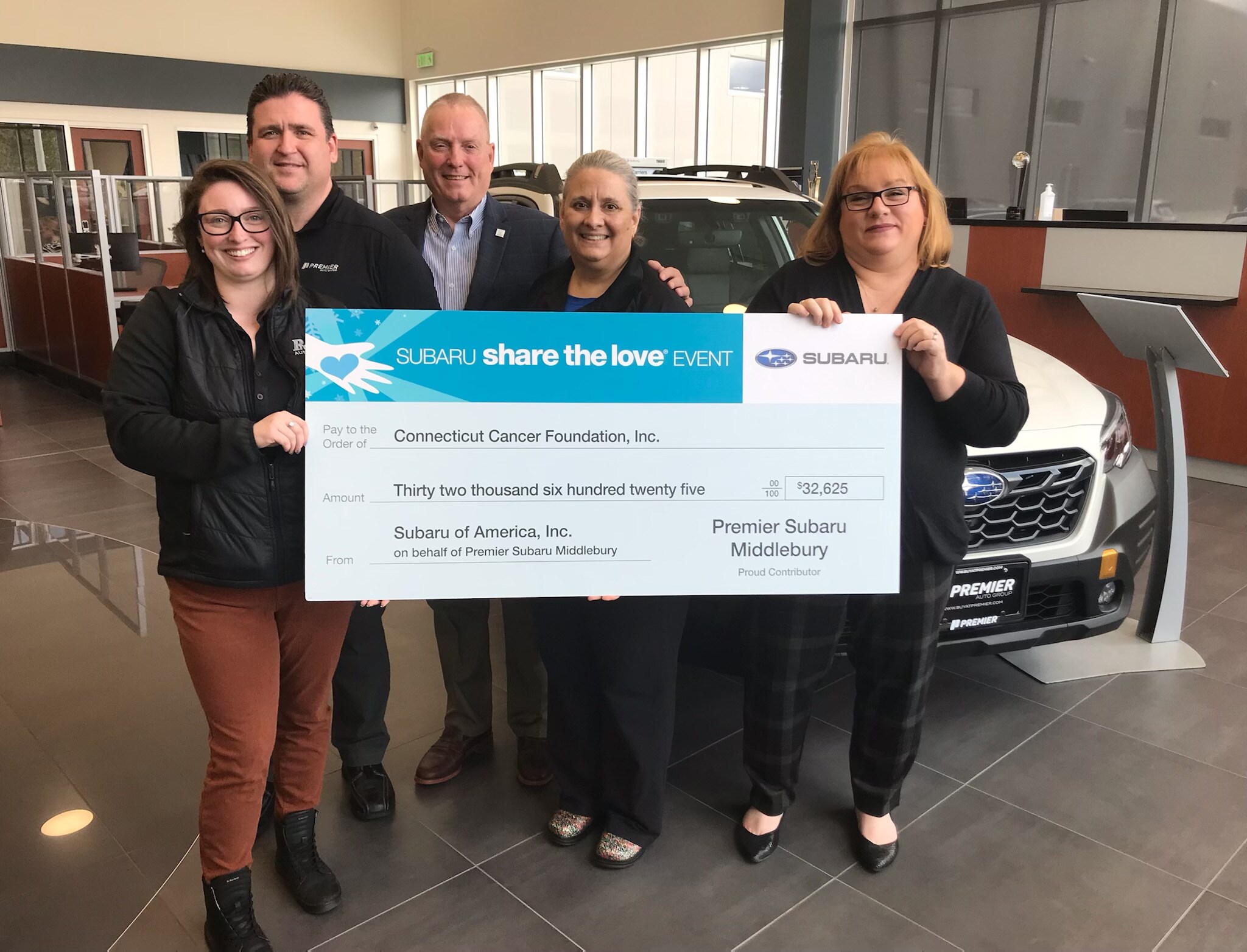3EEBFD4E-DD2E-428E-9127-BED180305377.JPEG Premier Subaru Middlebury presents a check to the Connecticut Cancer Foundation for the Share the Love Event