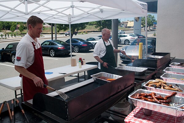 Prestige Imports GM Justin Adis mans the grill during Prestige Imports 2012 Mountain Tour barbecue Prestige Imports GM Justin Adis mans the grill during Prestige Imports 2012 Mountain Tour barbecue