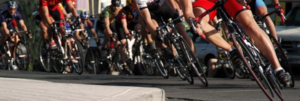 Road cyclists make a turn