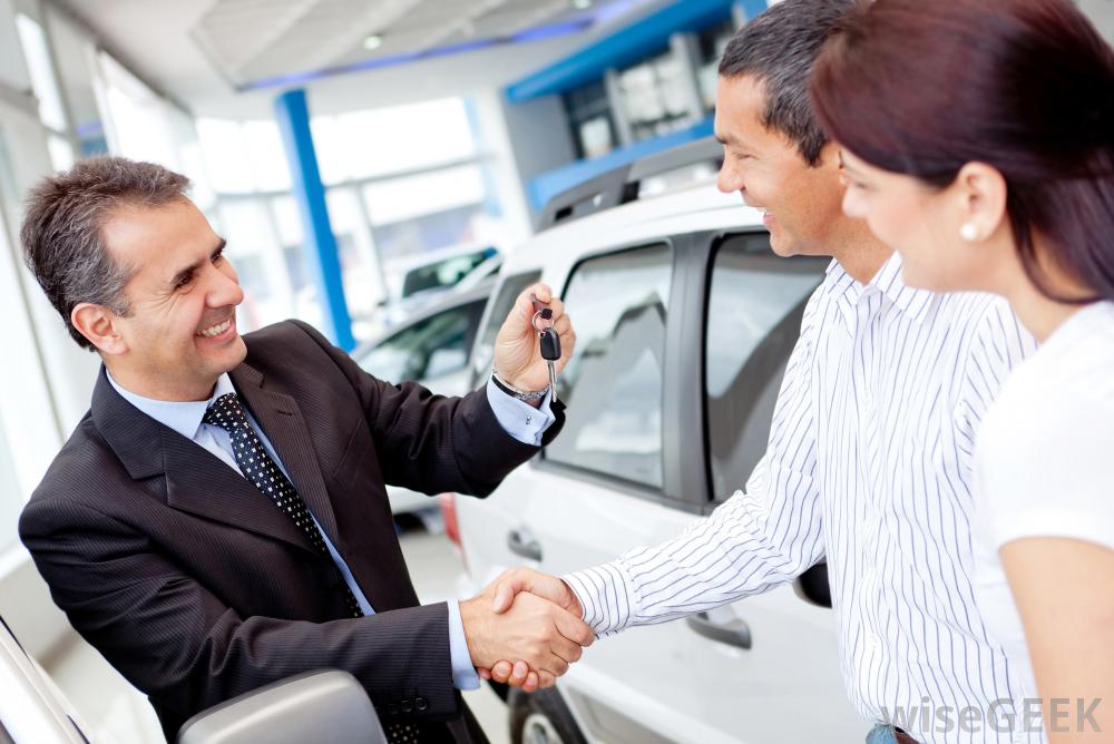 car-salesman-with-customers.jpg