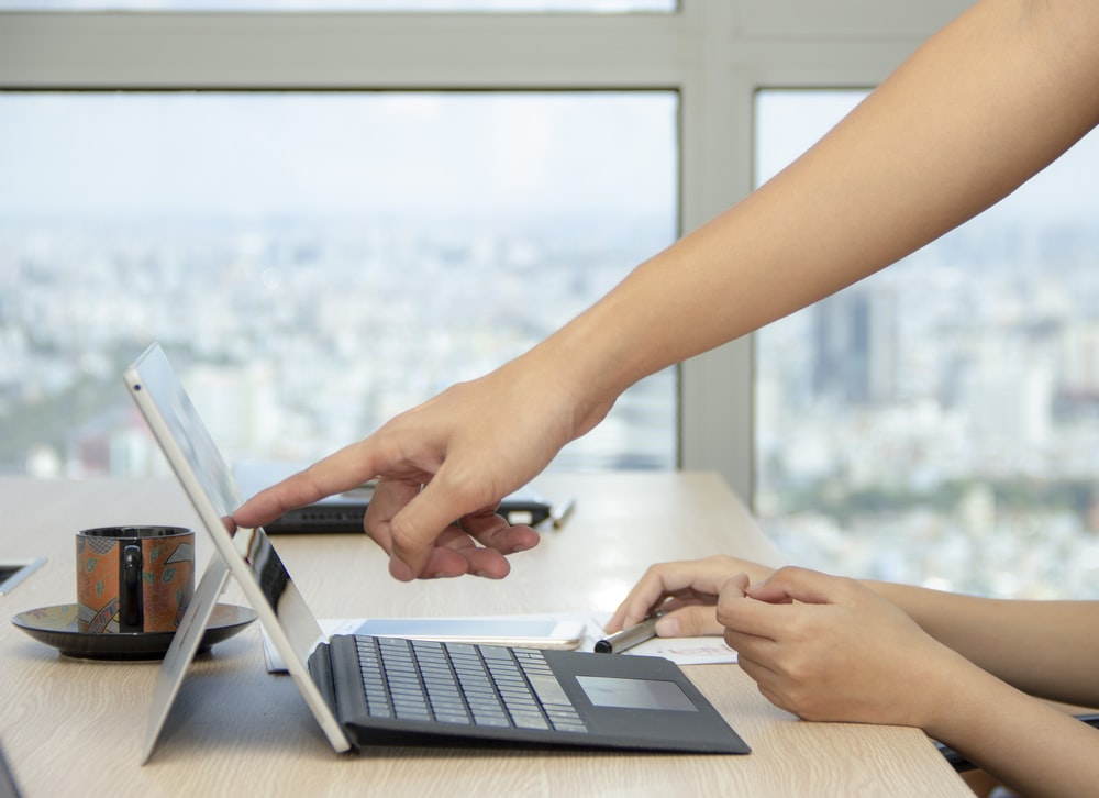 hands tablet pointing.jpg