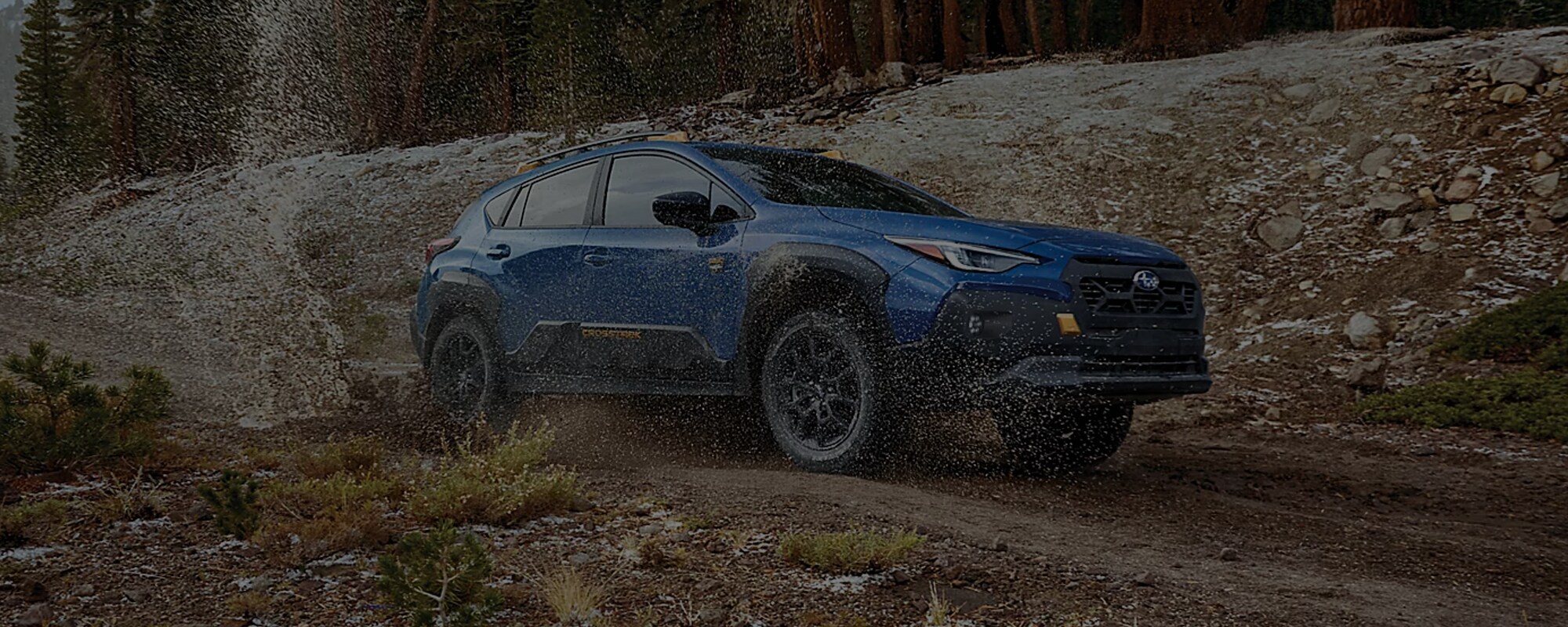 Front angle view of a 2027 Subaru Crosstrek parked on a scenic road in Ramsey, NJ.
