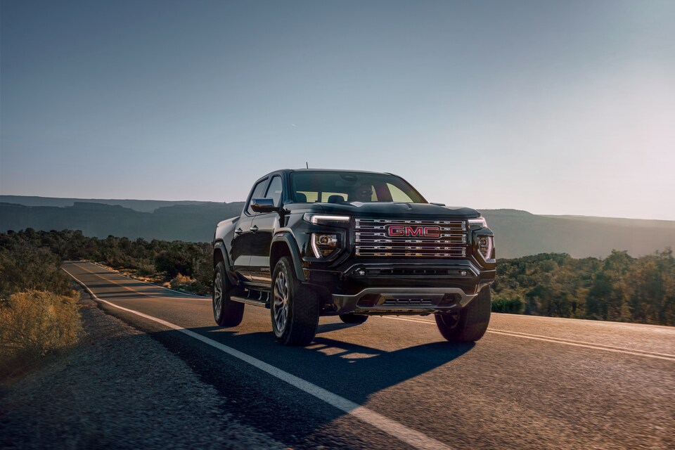 2023 GMC Canyon Denali Pickup Truck driving on road
