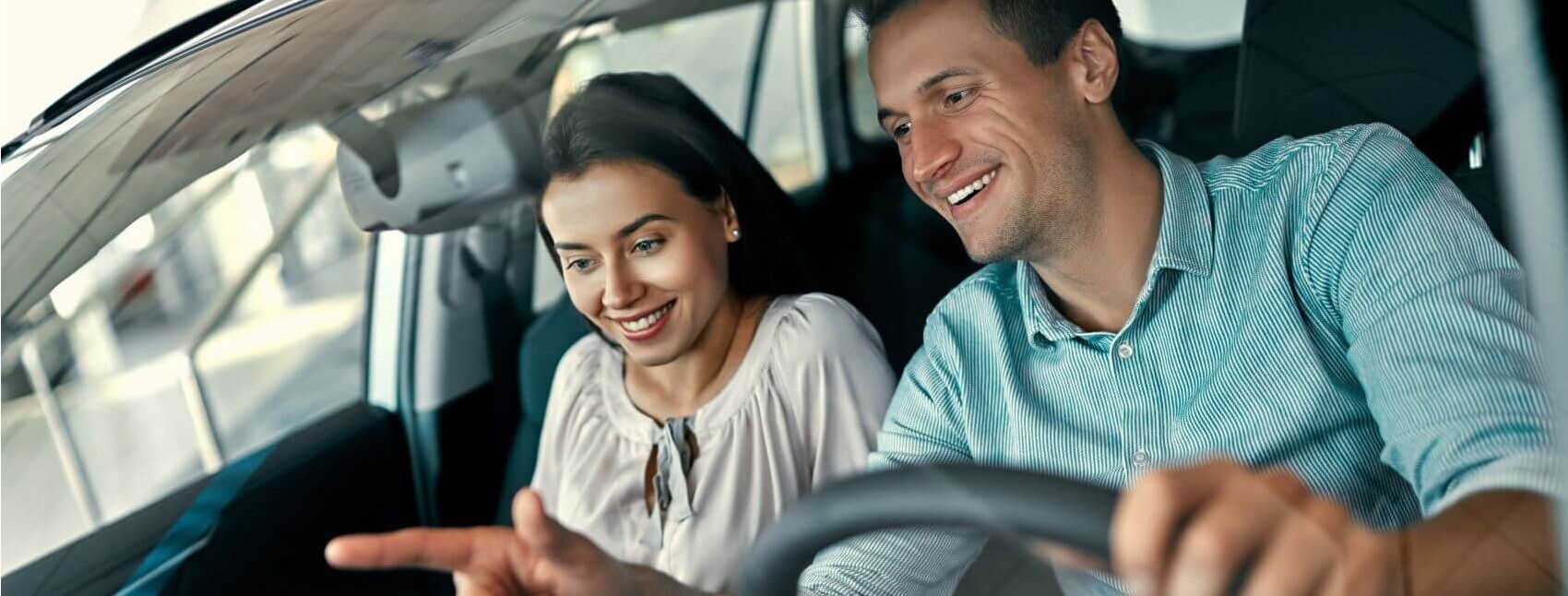 Couple Sitting in their Car