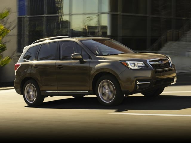 2018 Subaru Forester SUV brown being driven on road.jpg