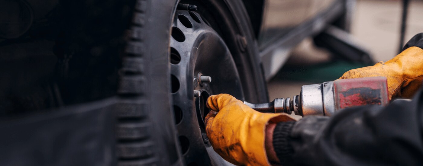 Mobile%20Mechanic%20Tire.png Mechanic replacing a tire on a vehicle
