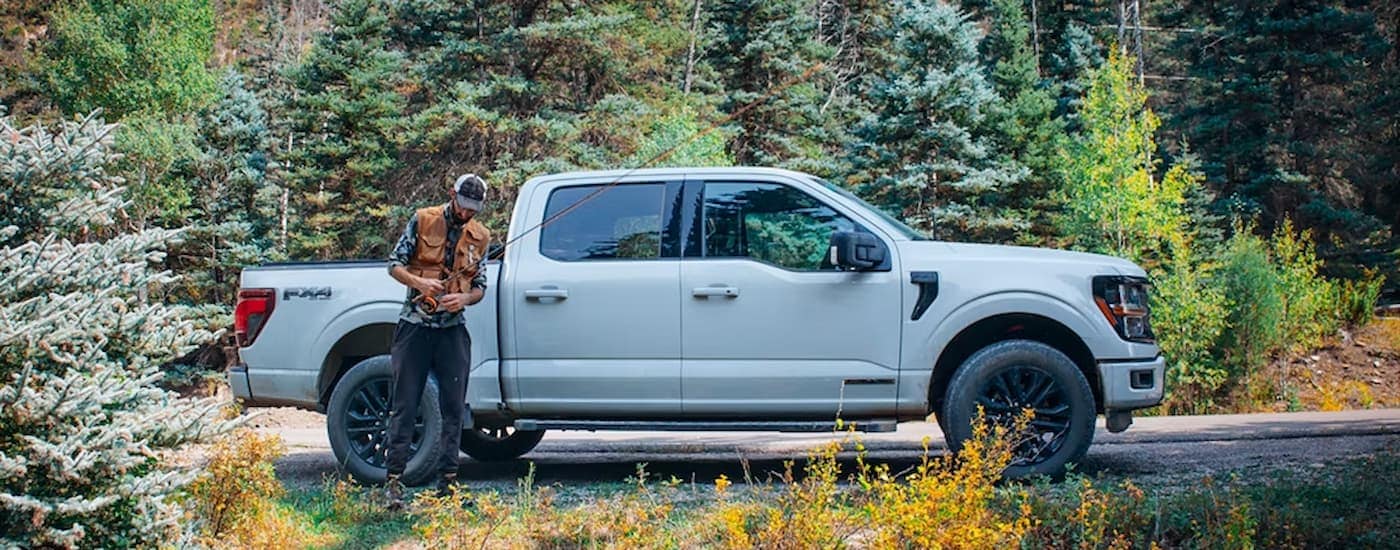 Trucks%20for%20Sale%20Near%20Defiance%20-%202026%20Ford%20F-150%20Side.jpg White 2026 Ford F-150 parked in the woods