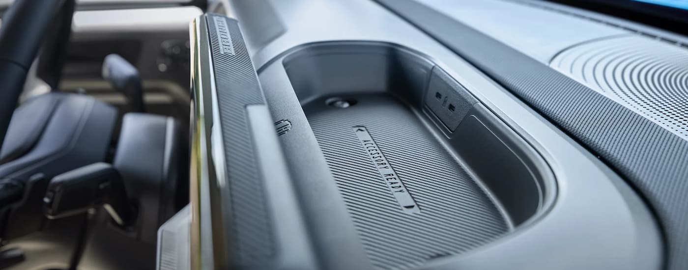 Ford%20Bronco%20Sport%20for%20Sale%20Near%20Forest%202025%20Ford%20Bronco%20Sport%20-%20Tray.jpg Dashboard storage section in a 2025 Ford Bronco Sport