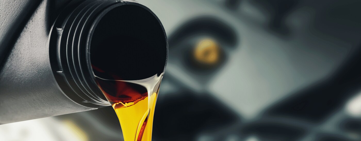 Mobile%20Mechanic%20Oil.png Engine oil pouring out of a grey bottle