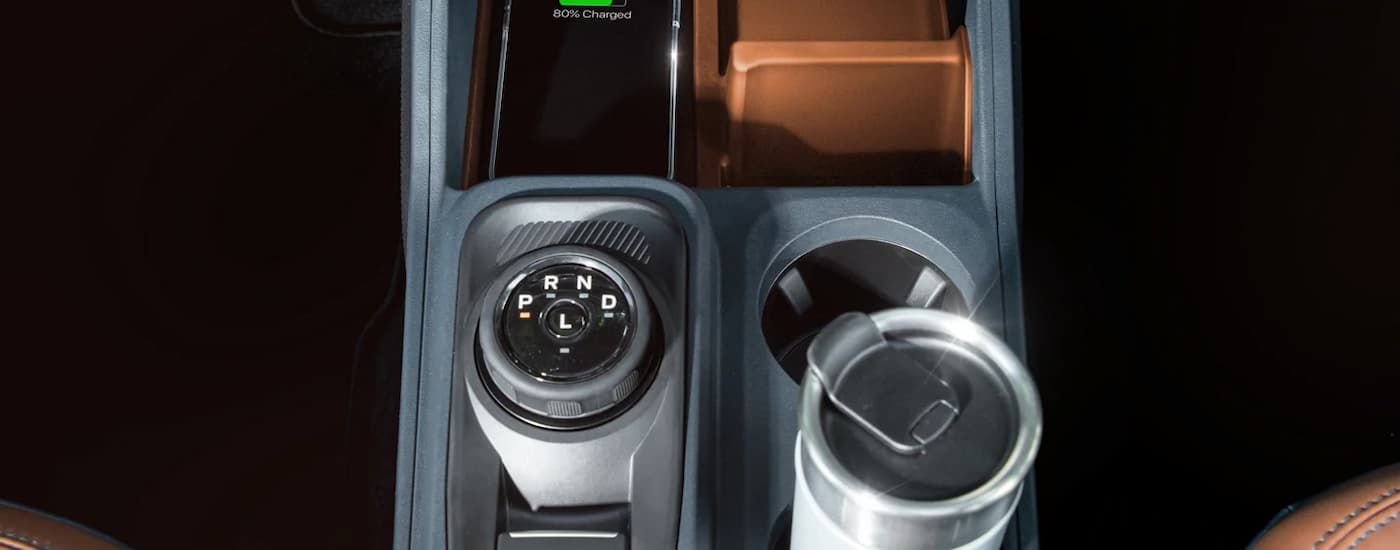 Trucks%20for%20Sale%20Near%20Nevada%20-%202024%20Ford%20Maverick%20-%20Wireless%20Charging.jpg Center console and charging station in a 2025 Ford Maverick truck for sale near Nevada