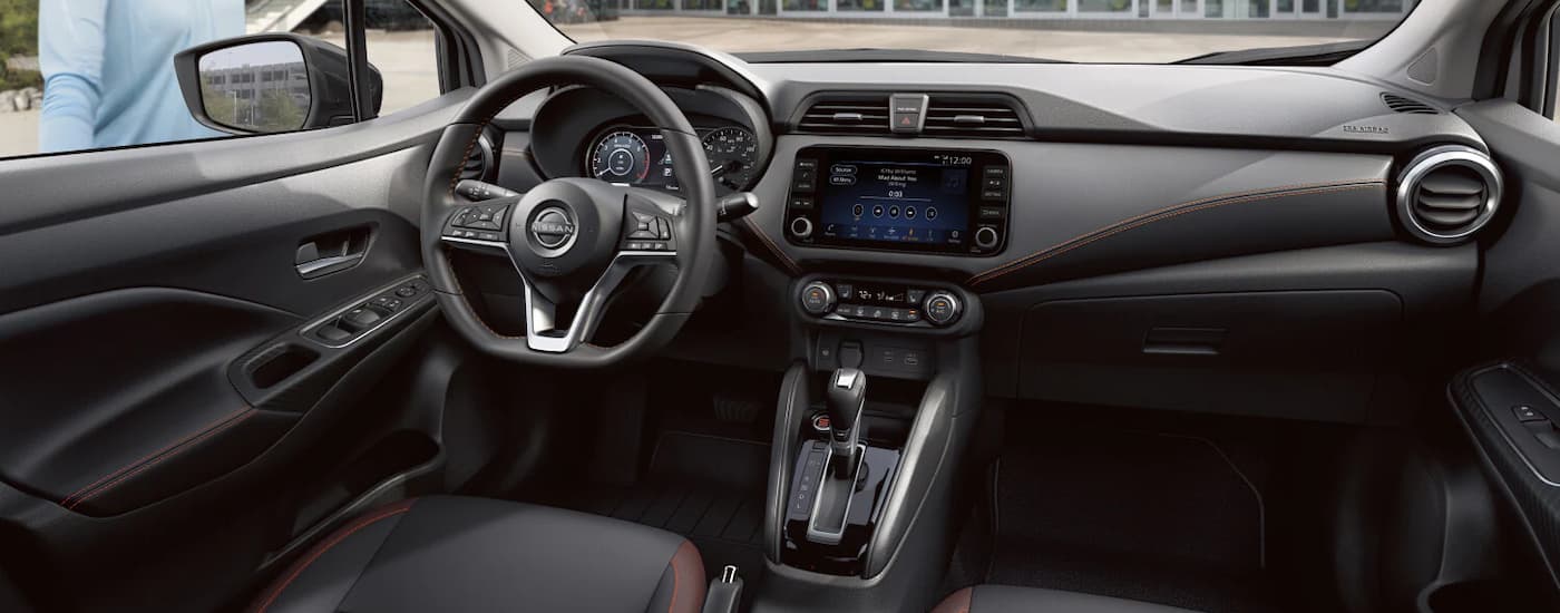 wlp%20-%202025%20Nissan%20Versa%20for%20Sale%20in%20Lima%20-%20Dash.jpg Infotainment display and digital gauge cluster in a 2025 Nissan Versa for sale in Lima