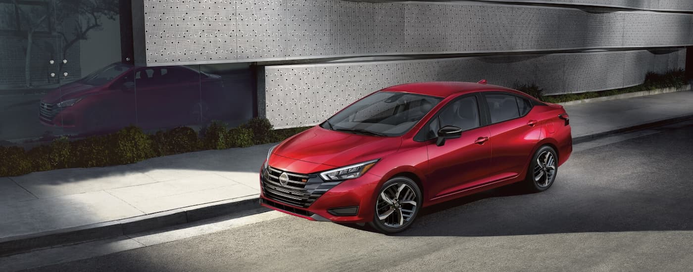 wlp%20-%202025Nissan%20Versa%20for%20Sale%20Near%20Findlay%20-%20red.jpg A red 2025 Nissan Versa parked for sale near Findlay