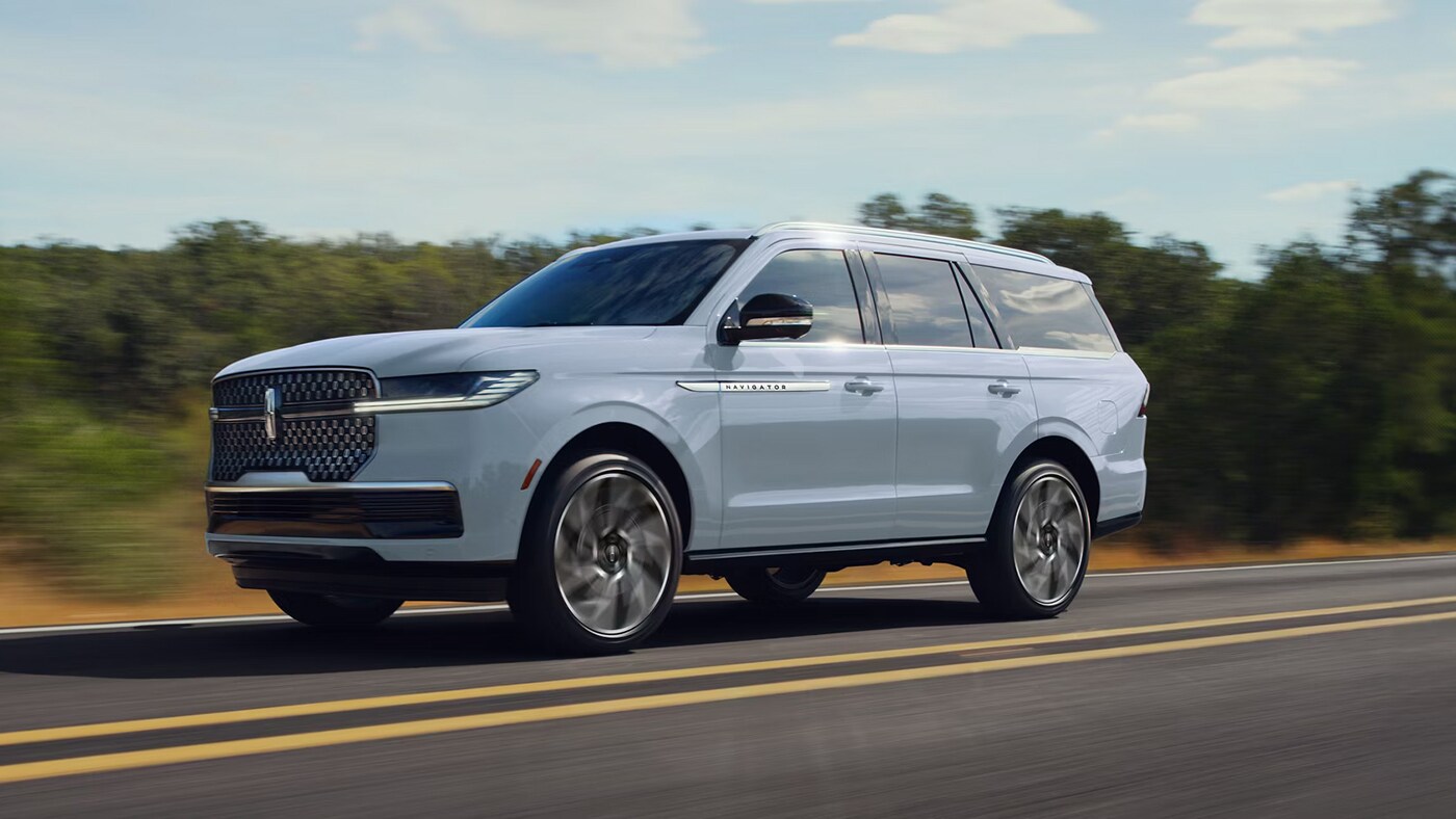 2026 Lincoln Navigator Driving Down a Road