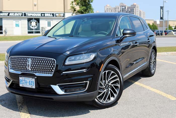 Lincoln Nautilus in black color on an outdoor parking lot.