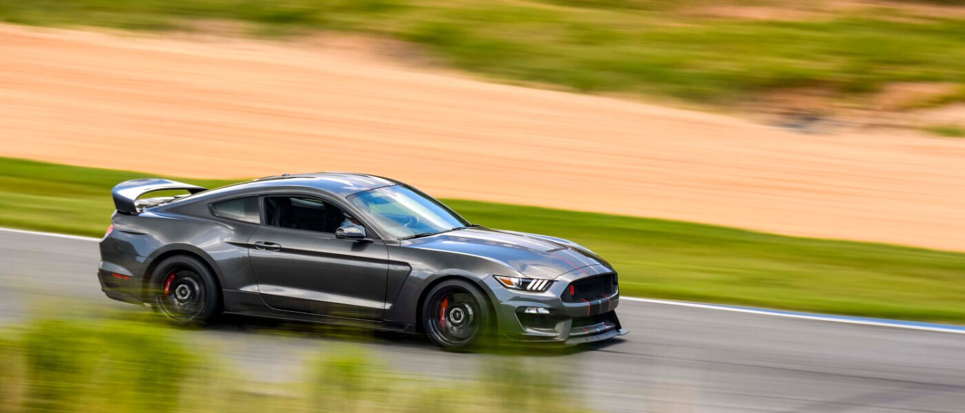 2020 Ford Mustang in Motion Driving on Track Side View